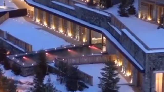 would you love to swim at this incredible chalet in the Alps after a day of skiing?