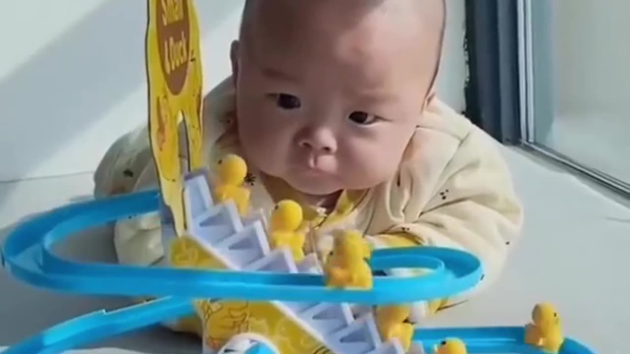 Baby In Total Awe Watching Wildlife Documentary