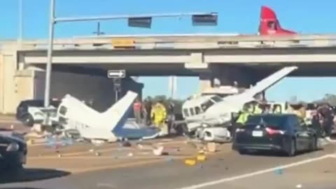 A small plane makes a emergency landing and crashing into multiple cars on a