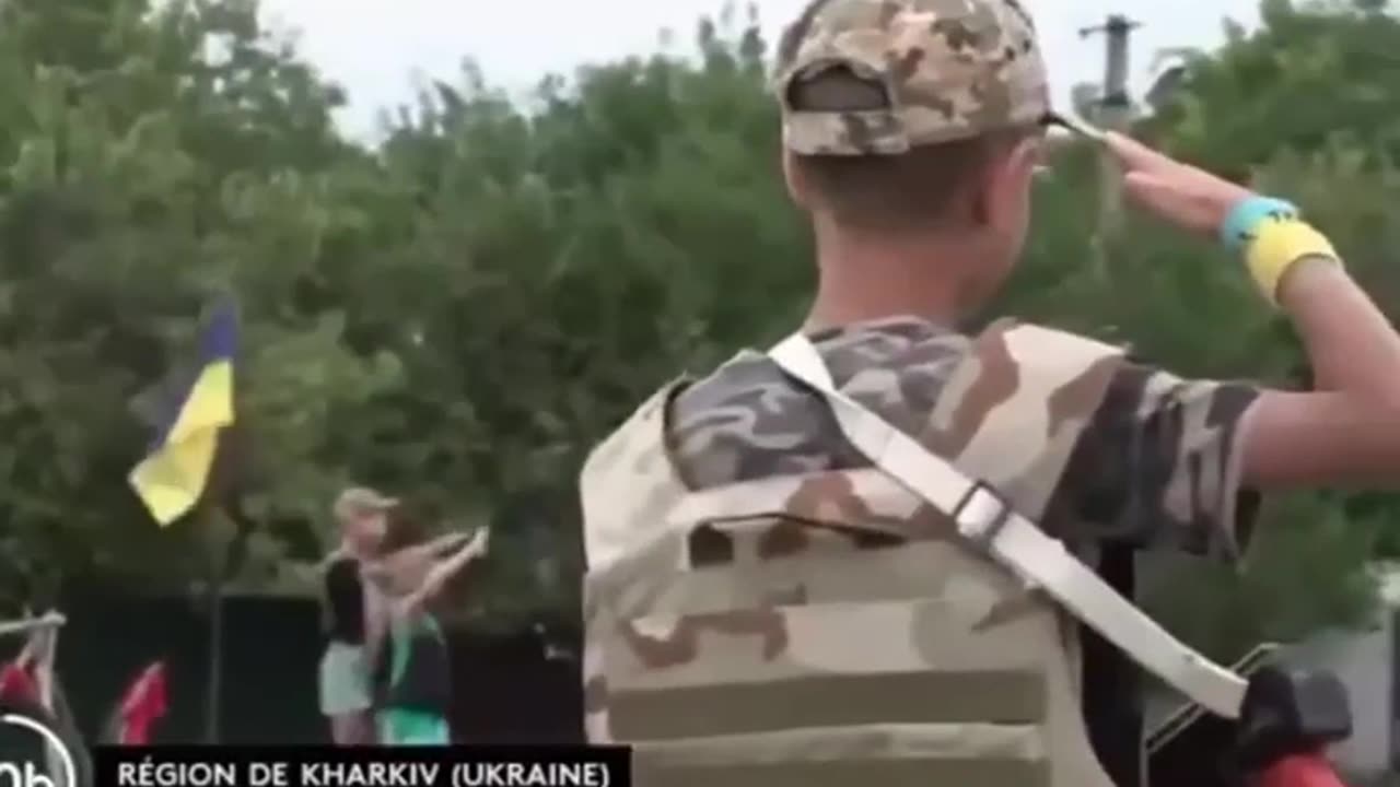 Ukrainian children saluting the army