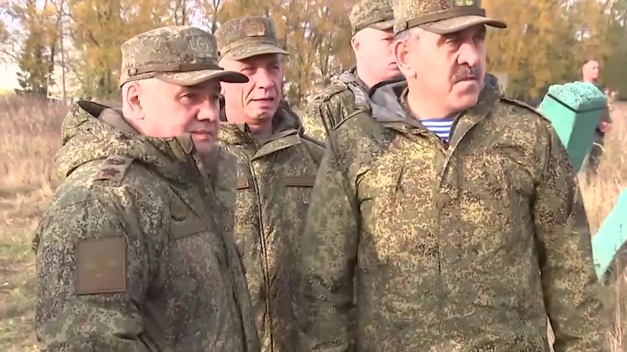 Russian Defence Minister General of the Army Sergei Shoigu inspects training grounds