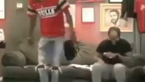 Black men laughing hysterically
