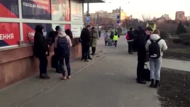 Ukrainians shelter in subway, expecting air strikes