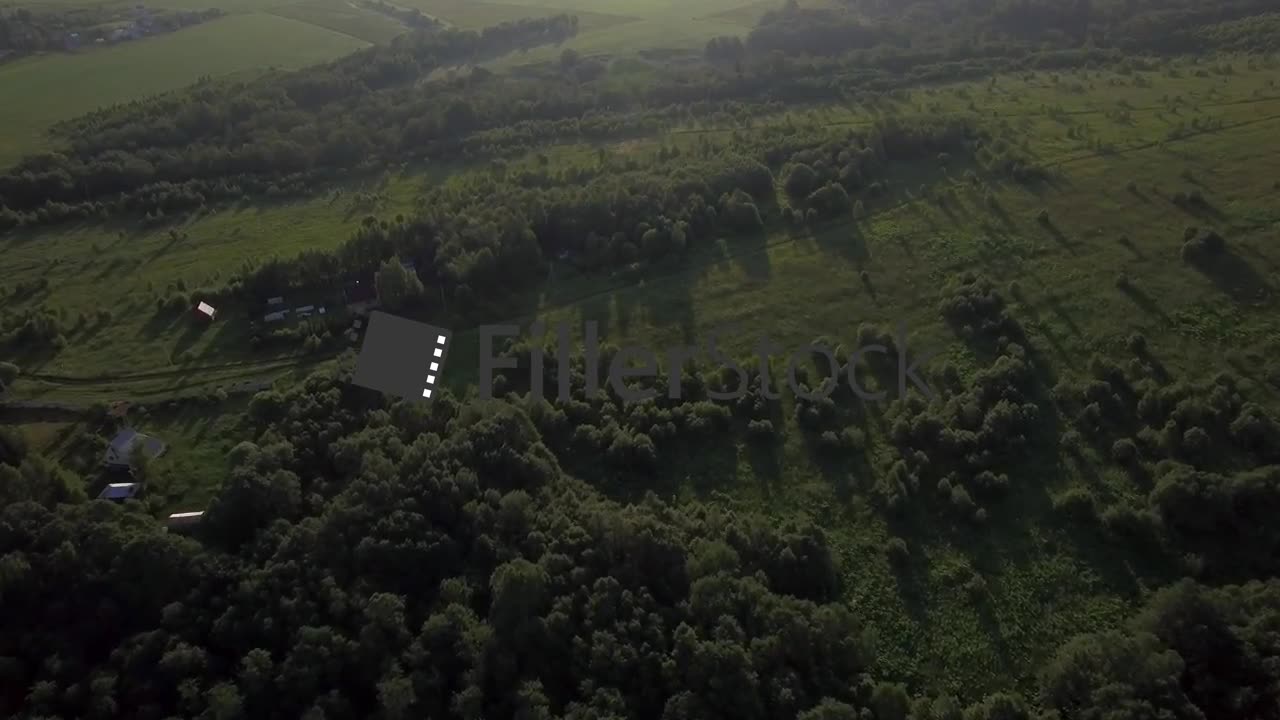 Aerial landscape with forests, fields and village in Russia