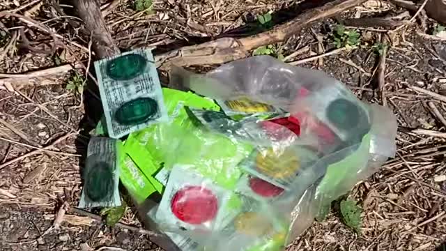 Why is there a big bag of condoms in the road?