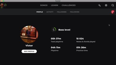Playing bass guitar in Yousician (2 April 2022)