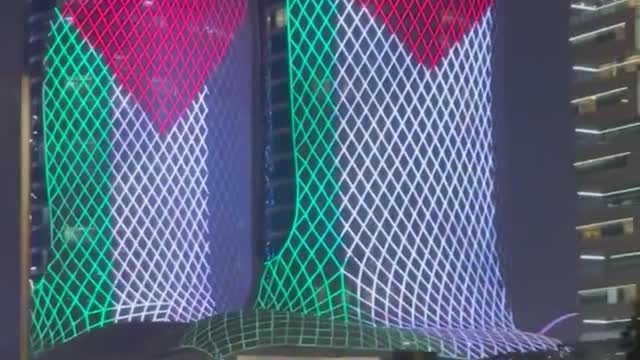 Al Jaber twin towers in Qatar’s Lusail city light up with the flag of Palestine to show solidarity