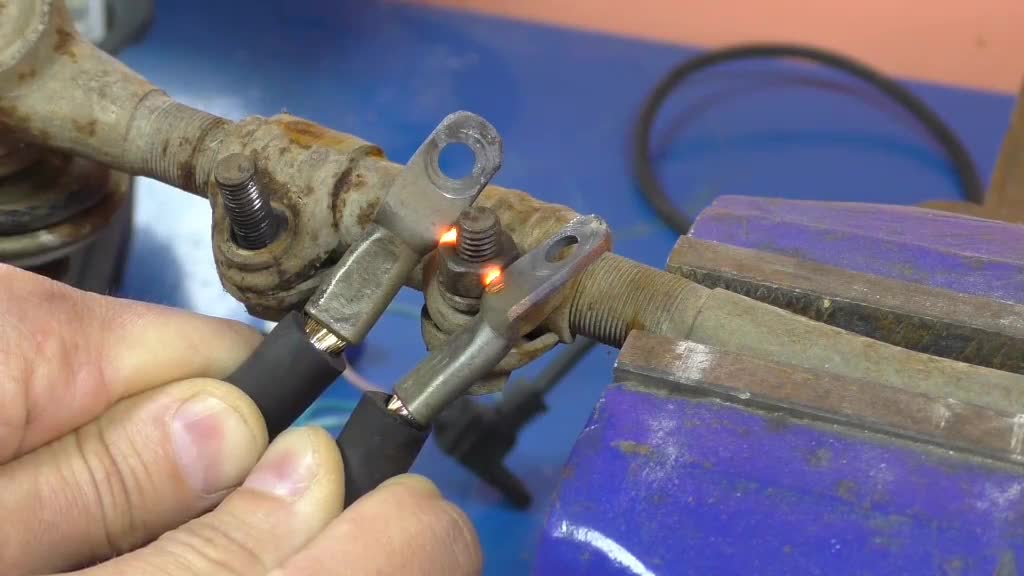 If the nut is difficult to remove, just heat it with the power supply.