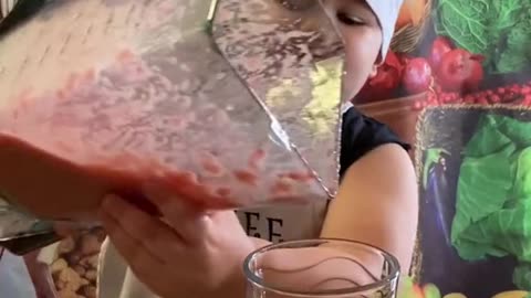 Kid making smoothie