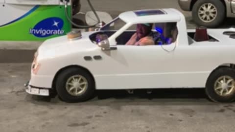 Tiny Car Cruising Around Chicago