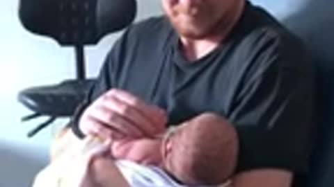 Dad meeting son for first time