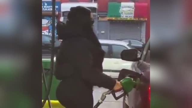 Girl spits gas pump to fit