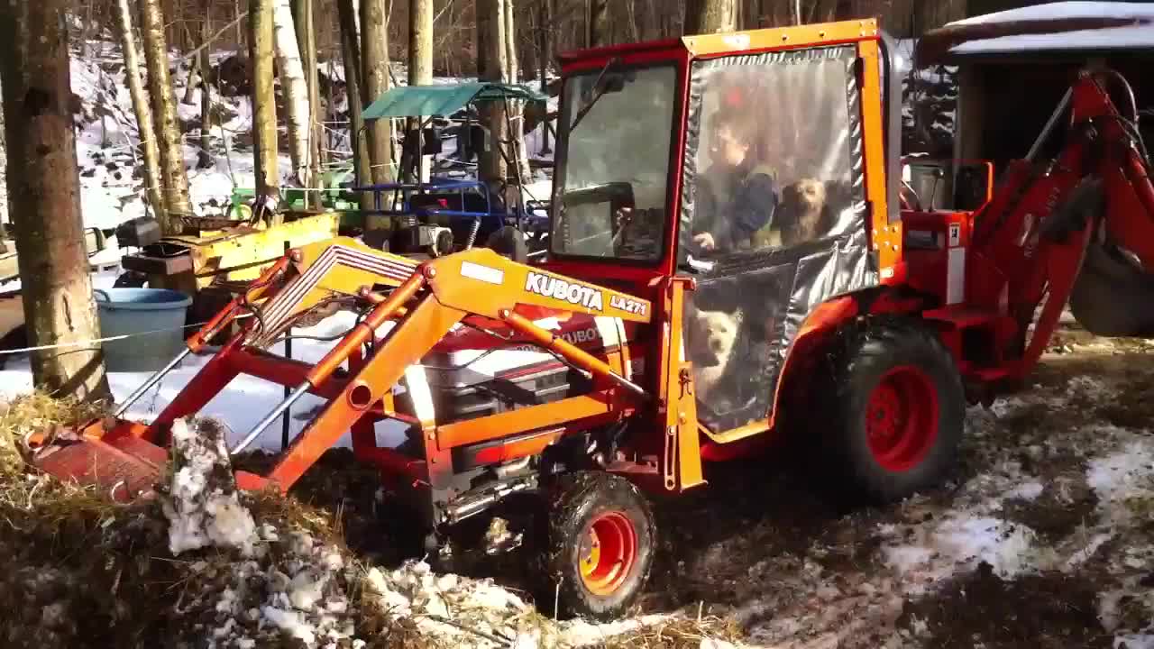 Daniel and the boys in the Kubota.