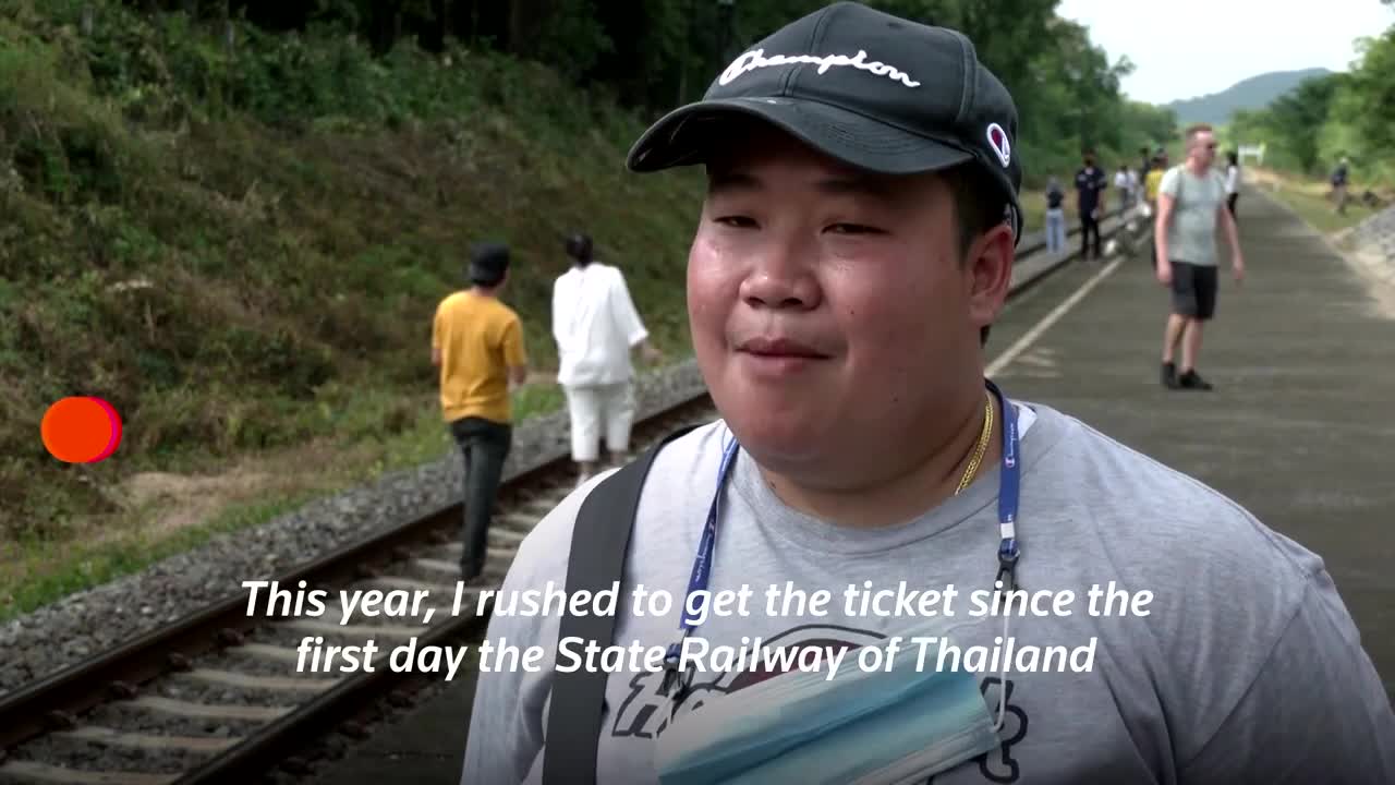 Thailand's 'floating train' a hit as dam waters rise