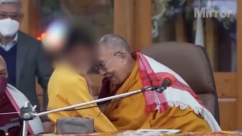 dalai lama kissing boy