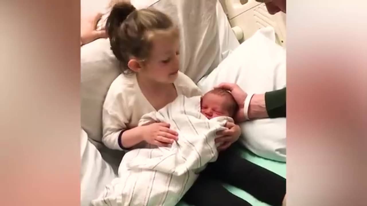 Hilarious Reactions Of Babies Meeting Newborns For The First Time