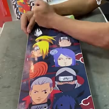 Attaching a grip tape and wheels to a skateboard!