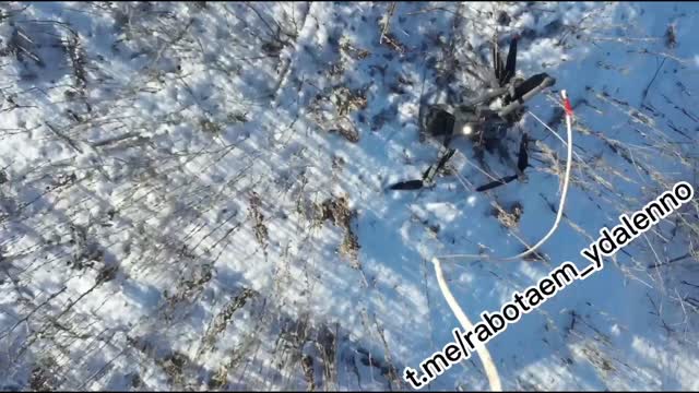 Russian soldiers in rescue operation to save damaged Mavic drone