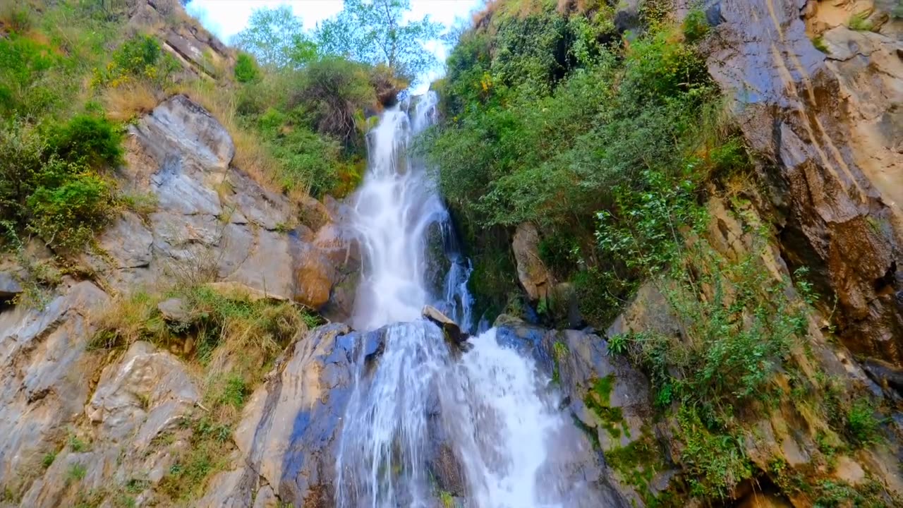 Relaxing music along with beautiful waterfall