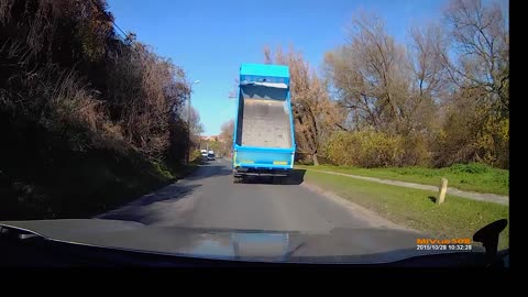 Truck Drives With Upright Loader