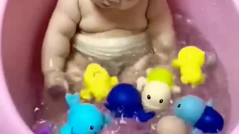 Cute Baby Playing With Water