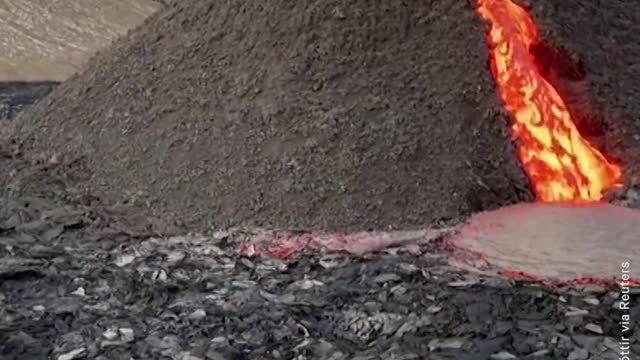 Iceland Volcano Erupts Behind People Playing Volleyball