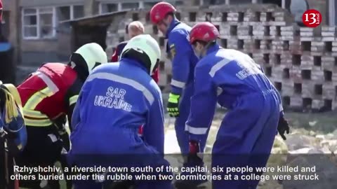Emergency workers carry out body from attack site near Kyiv - police video