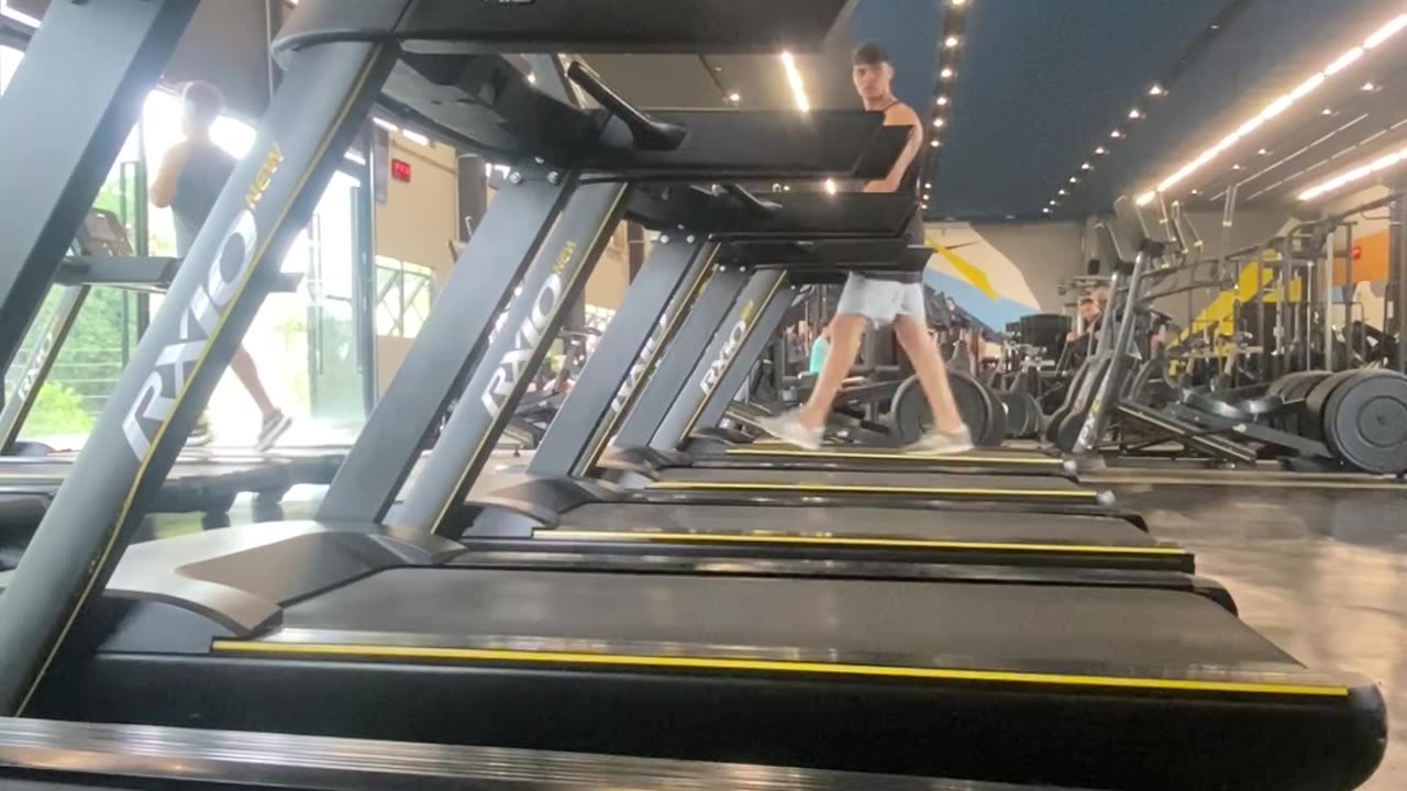 Woman Slips On Treadmill While Gym Ignores Her