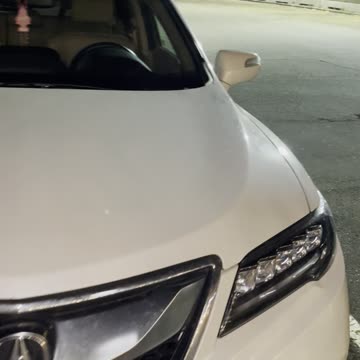 Great white Acura car 2024