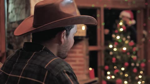 A man receives a Christmas gift