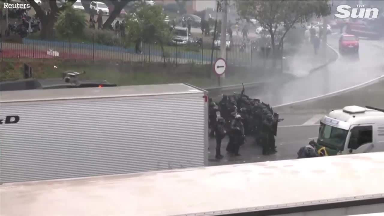 Brazilian police fire water cannons and rubber bullets at anti Lula protesters