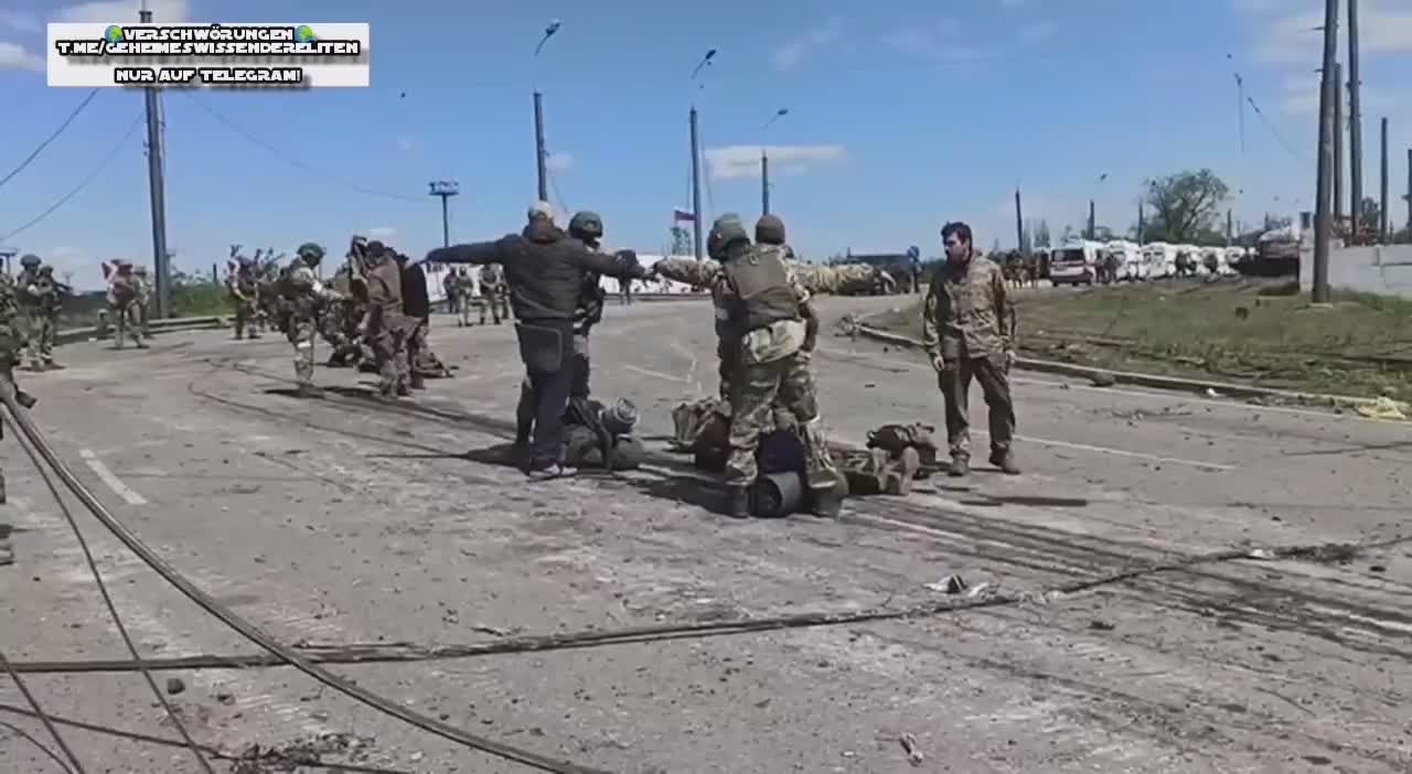 surrendering Ukrainian forces in the former boiler of the steel plant ASOW-STAHL