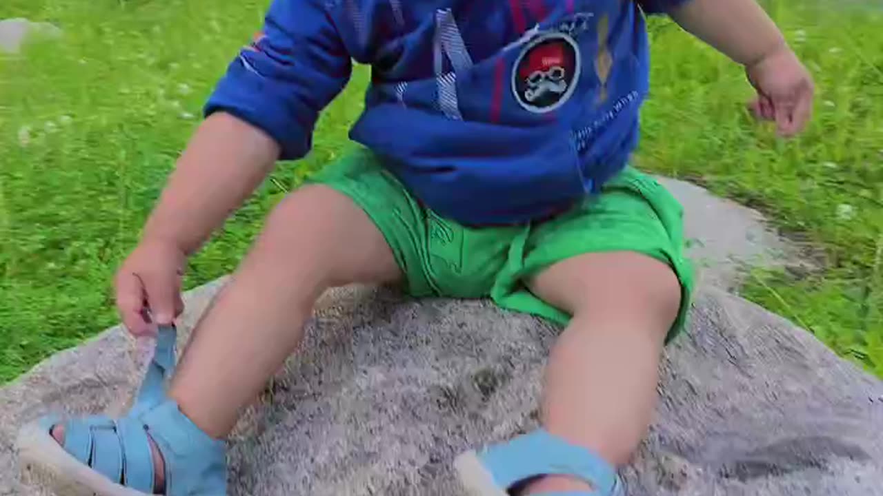 A cute kid is playing in nature ,cute videos