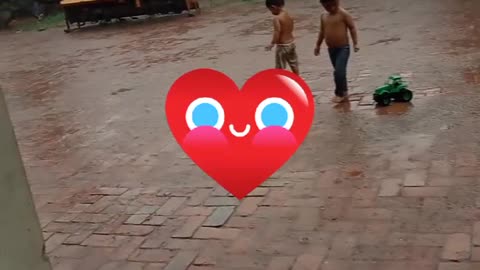 Baby playing at Rain