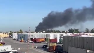 The plume of hazardous black smoke from the Medley, Florida “random” industrial explosion