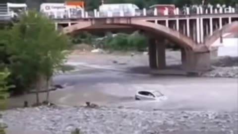 Car fallen from bridge |