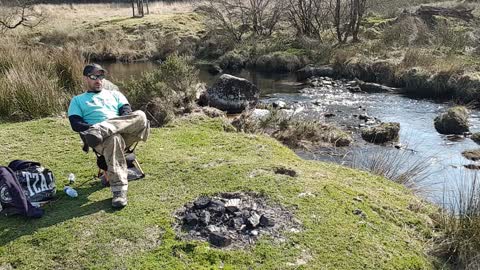 Vlog by a river .