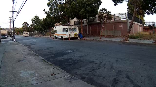 Homeless Guy Fixin RV roof early in the Mornin