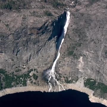 Here are stunning Yosemite aerial views of Wapama Falls and Bridal Veil Falls.