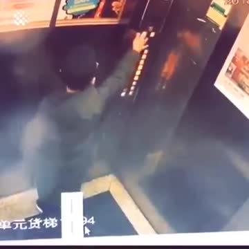 Asian man urinates in elevator then gets stuck