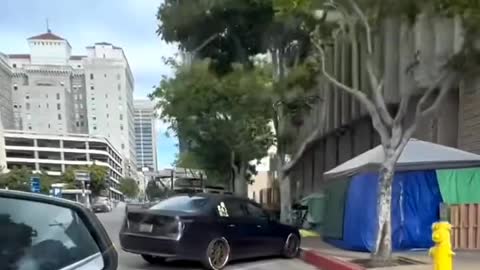 Welcome to San Diego. Make yourself at home with a tent on the street.