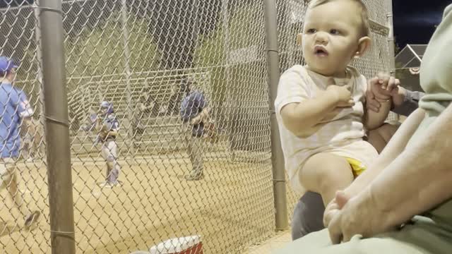 Baby Unsure How to High Five Woman With Missing Hand