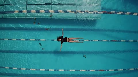 A Woman Floating in the Pool