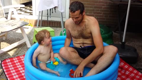 Baby fun _ funny laughing _ with dad daddy in mini _ pool _ hilarious _