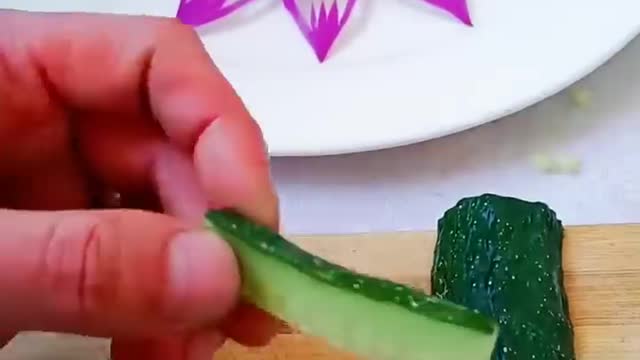 #awesome decoration of onion and cucumber on a plate #