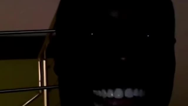 EXTREMELY Funny Black Guy Laughing in the Dark !