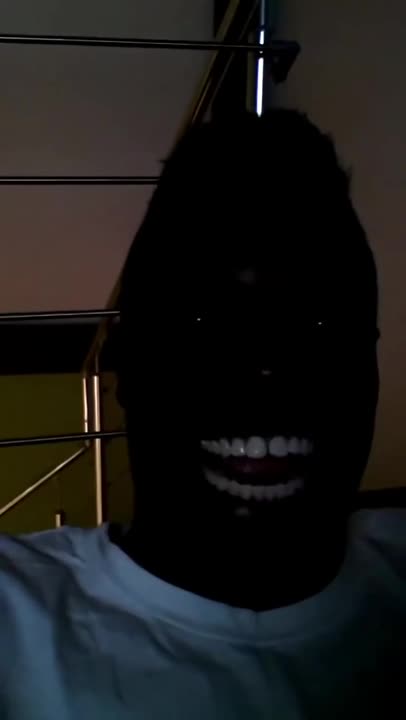 EXTREMELY Funny Black Guy Laughing in the Dark !