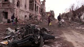 Video shows burnt-out tanks, debris in Mariupol