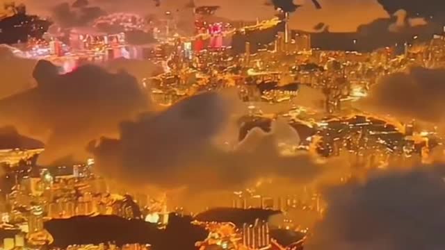 Night city through the clouds