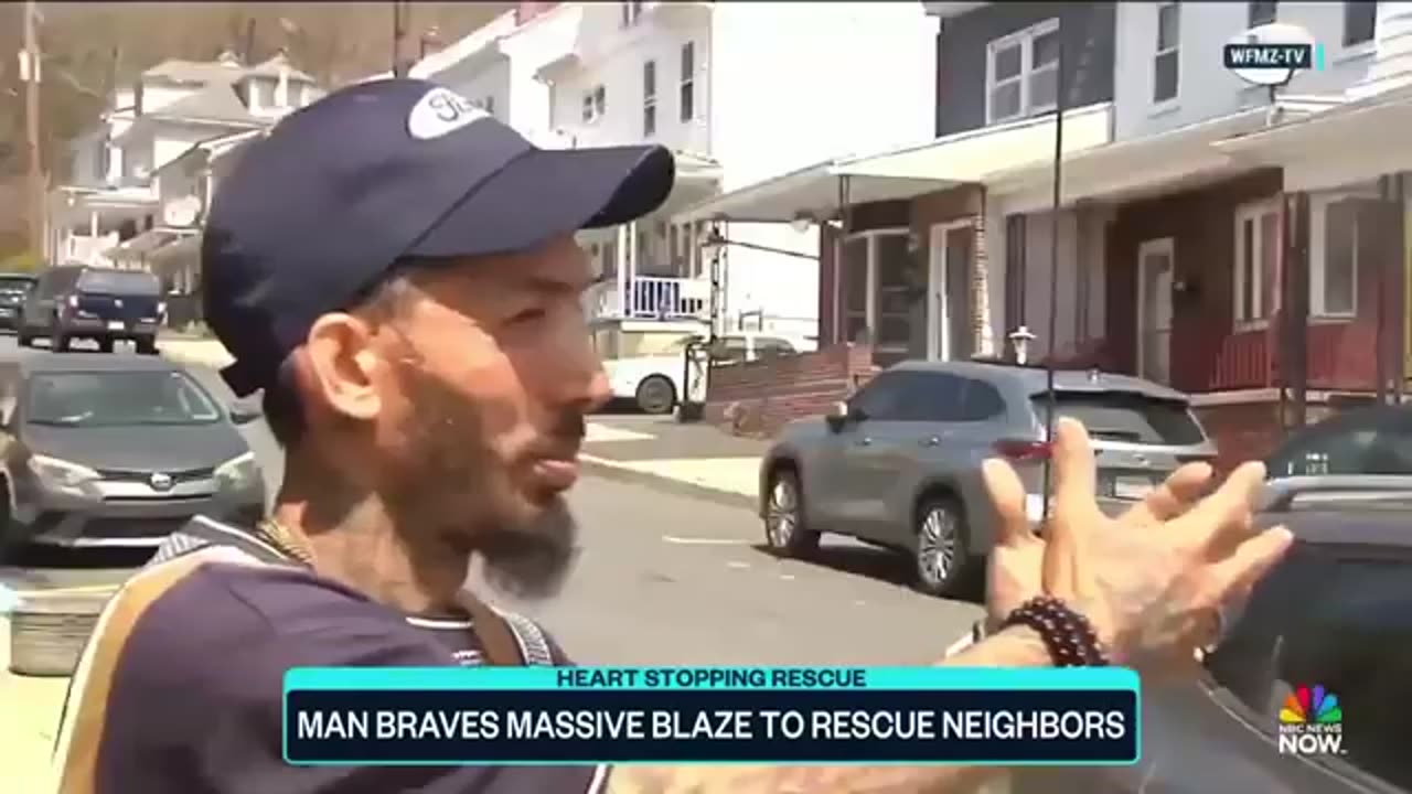 Man rescues neighbors from burning home